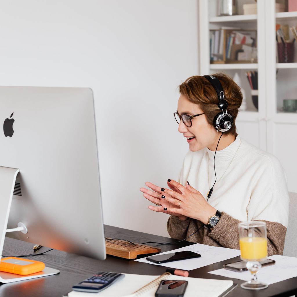 A customer success specialist on a video call with a client