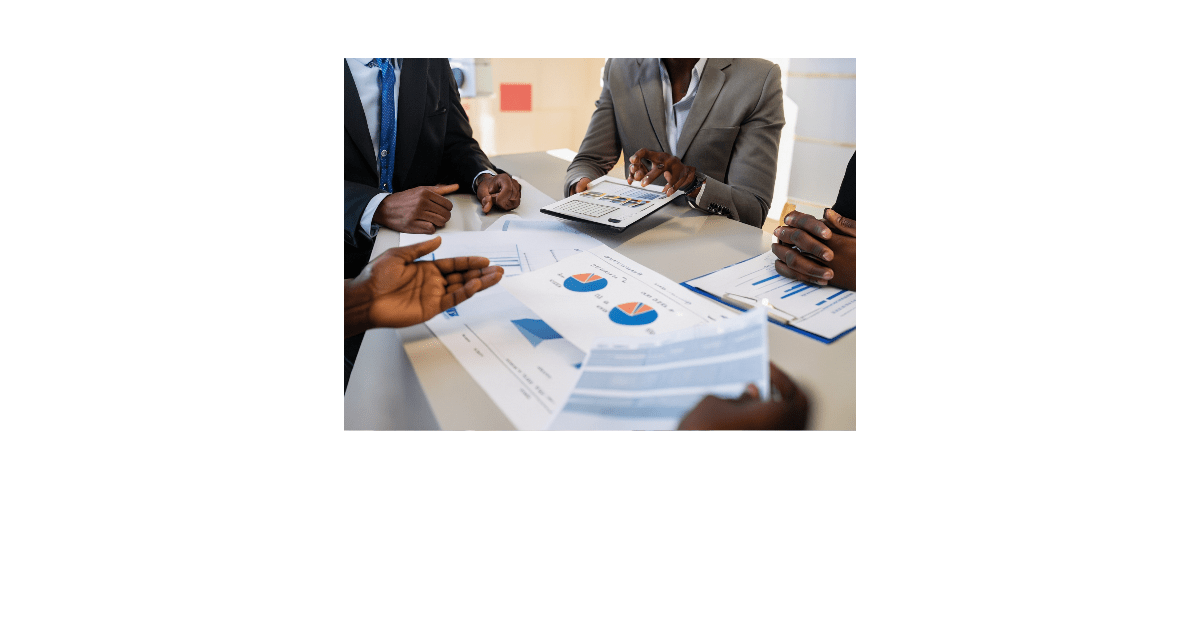 A sales team discussing the cost comparison between SDR outsourcing and in-house SDRs